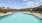 Community Pool with Picnic Area and Poolside Loungers